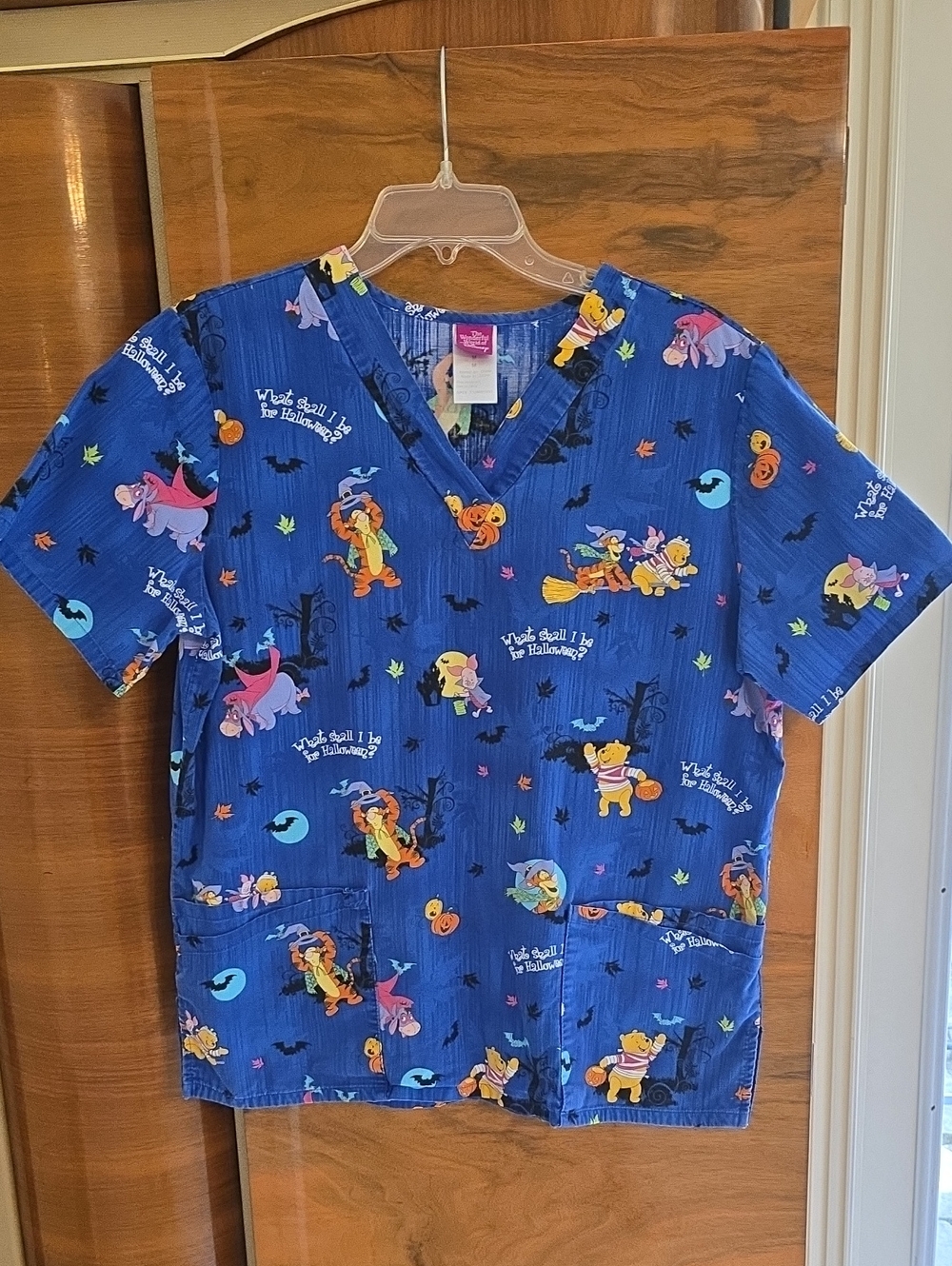 Woman's Scrub Top In Blue Winnie the Pooh Halloween